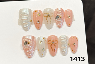 Pearl Shell & Gold Wire Bow Almond